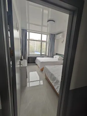 Muling Xinyueguang Inn Hotels in Muling