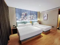 Magnotel Business Hotel (Longjiang Zhigang Plaza) - 2-Star