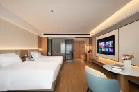 Hilman Lizhi Hotel (Ledong High speed Railway Station Branch) فنادق في له دونغ
