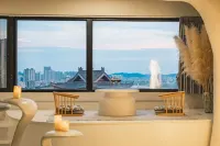 Spring River View Design Guesthouse (Chaoyang Square Subway Station Sanjie Liangxiang)