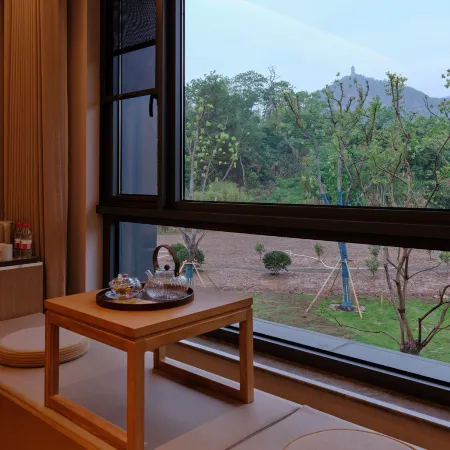 Ruolin Qiaoshangu Graden Hotel