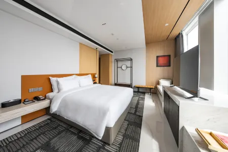 Mochi Boutique Hotel Отели рядом с достопримечательностью «Ningbo University of Technology (East Campus)»