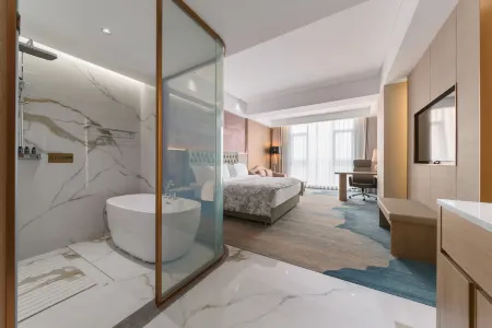 SHENGBAOLONG INTERNATIONAL HOTEL Отели рядом с достопримечательностью «Tanxinpei Park»