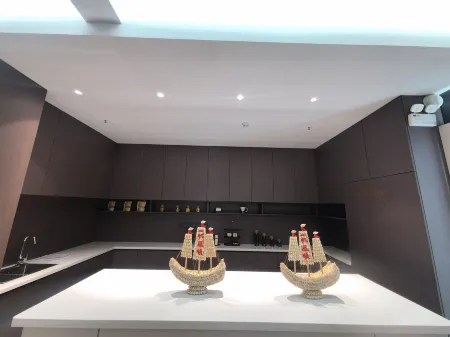 Longkou Golden Coast Resort Hotel (Donghai Pier Seafood Market) Отели рядом с достопримечательностью «Dao'enhu Park»