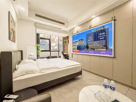 Geyou Apartment (Liuhe Xiongzhou Subway Station Guesthouse) Отели рядом с достопримечательностью «Wanshougong»