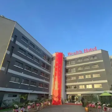Wealth International Hotel (Ikeja Lagos  Mohammed Airport Branch  Three Meals and Transfer Service)