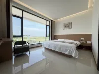 Weishan Evening Shore Cottage Inn - parkir