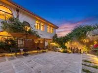 Floral Hotel·Guihai Lazy Cat Holiday Guesthouse (Putao Beach Location) - maisons de vacances
