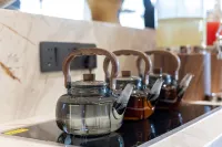 Dehong Mangshi Yasifeier Hotel - parcheggio