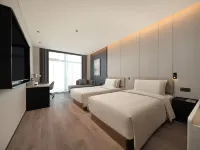 Ningbo Jiangbei Kongpu Subway Station Atour Hotel - ที่มีที่จอดรถ