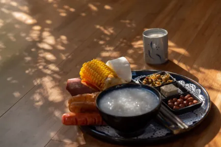 JANE Hot Spring Hotel (Anji Yunshang Grassland Panda Tribe Adventure Park Branch) Отели рядом с достопримечательностью «wu he cun»