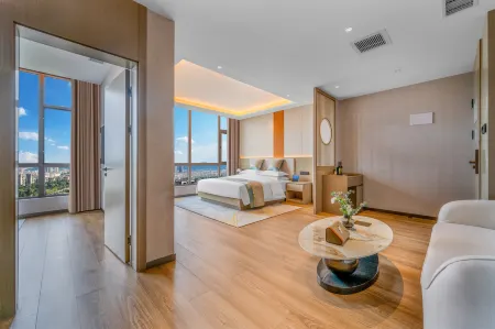 Taifeng Hotel (Qujing Wanda Bund) Отели в г. Цюйцзин