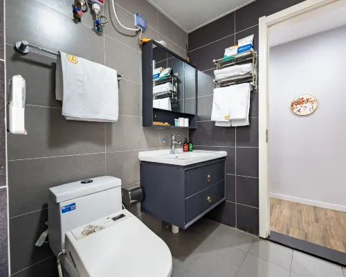 Qingyun Boutique Vacation Apartment (Weihai High-Speed Railway Station Hanlefang) Zimmer Photos