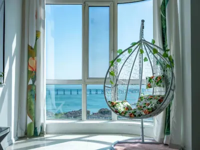 Dalian Xinghai Time Seaview Homestay Hotel berhampiran Dataran Xinghai