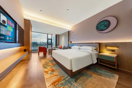 Jinfeng Hotel Отели рядом с достопримечательностью «Longxing Lecture Temple»