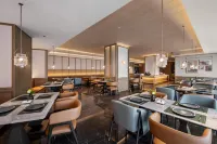 Manxin Hotel Xichang Qionghai 17 Degree Torch Square - breakfast