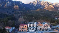Muqingsenyu Homestay Отели рядом с достопримечательностью «Лумофонная дыра»