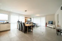 Serene Swiss Apt | scenic balcony views + parking - Homestays