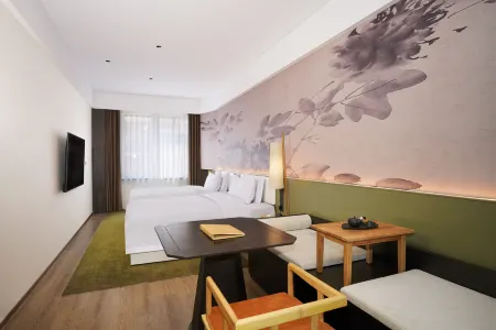 Renjoy Hotel (Luoyang Xiaojie Tianfu Railway Station) Отели рядом с достопримечательностью «Zhouwangcheng Square»