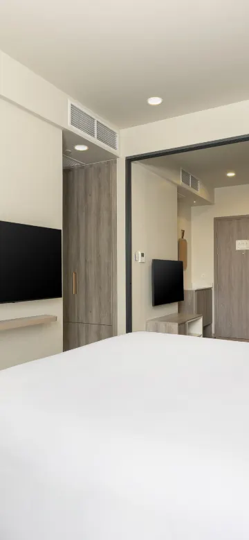 ห้องสวีท 1 ห้องนอน พร้อมห้องครัวและระเบียง