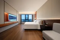 Yuezhi Hotel (Longhu Yantai Longkou Tianjiao Store)
