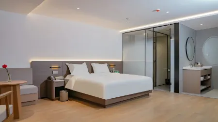 Milai  Hotel Отели рядом со станцией Jieshounan Railway Station