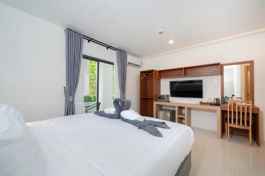 ห้องดีลักซ์ เตียงใหญ่ 1 เตียง