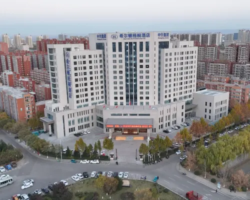 Hilton Wutong Hotel فنادق في شياو إي