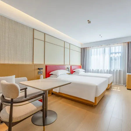 Rezen Huasheng Hotel (Daqing East Station)