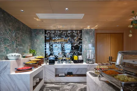 Yili Minghao Hotel Отели рядом с достопримечательностью «East China University of Technology (Nanchang Campus)»