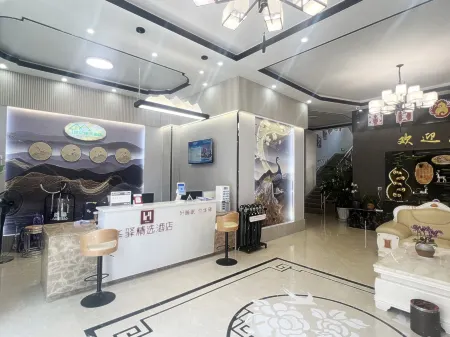 Rujia China Inn Hotel (Lincang Shuangjiang Abu Gulu) Отели рядом с достопримечательностью «White Elephant Temple»