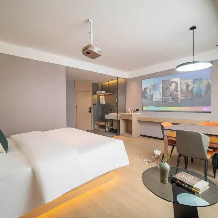 KMF Shadow Stay Smart Hotel(Zhenfeng Bus Station Zhenfeng Ancient City Store) Отели в г. Чженьфен