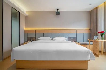 Maitreya Batimanju Hotel (Huquan Ecological Park Branch) Отели рядом с достопримечательностью «Honghe Nativeland»