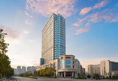 Yameisi International Hotel Отели рядом с достопримечательностью «Чунь Юй Торговый Город»