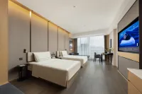 オルドス東勝区全民健身センターアトゥールホテル オルドス市東勝スポーツセンター周辺のホテル