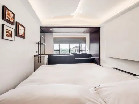 Jimo Designer Hotel (Qingyuan Yiwu Trade City Branch) Отели рядом с достопримечательностью «Qingyuan Museum»