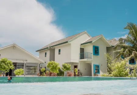 Long Beach Laamu Отели в г. Востраў Ган