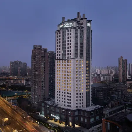 Four Points by Sheraton Wuxi Liangxi Отели рядом с достопримечательностью «Театр Мир»