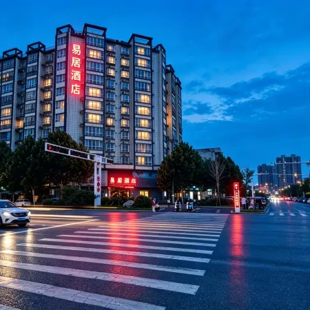 Weihui Yiju Hotel (Bus Station) Отели в г. Вэйхуэй