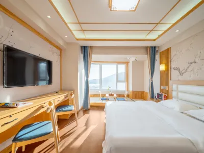 Sihe Boutique Apartment (Dalian Shibeiwan Water Park) Hotel a 
