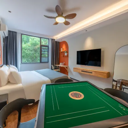 Huajian Meisu Hotel (Xinyang Railway Station Tianrun Plaza)