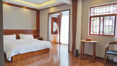 Eshan Huajianyu Inn Hotel dekat Eshan Stadium