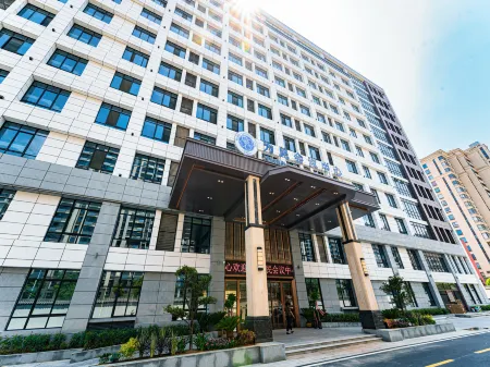 Weimin Convention Center Hotel Отели в г. Фэйдун