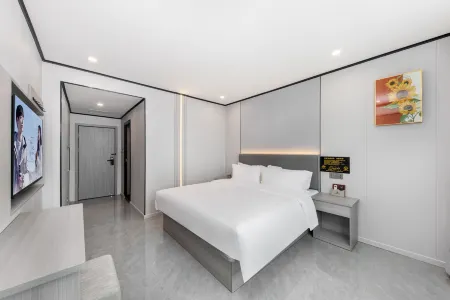 Meijin Hotel  ( Transfer Store ) Отели рядом с достопримечательностью «Huaihua Vocational and Technical College»