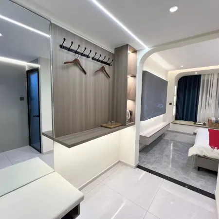 Qichun Guocui Apartment Hotele w: Hunchun