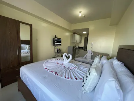 Green Residences Stays by PBYY Отели рядом с достопримечательностью «Падре Бланко Гарденс»