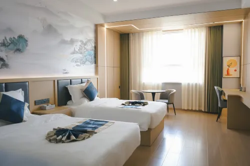 โรงแรมฮอลิเดย์ อินน์ ซินเฉิง ไป่เฉิง - ที่มีที่จอดรถ