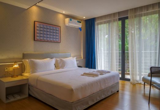 Harmony Hotel의 발코니가 있는 객실 또는 골프장 전망