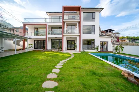 Tonglu Tangxia 91 Homestay Отели в г. Тунлу