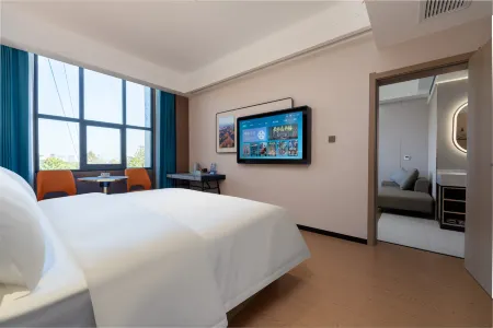 H Hotel (Yiyang Hunan City College) Отели рядом с достопримечательностью «Bailu Temple»